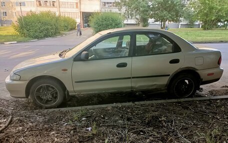 Mazda 323, 1998 год, 150 000 рублей, 5 фотография