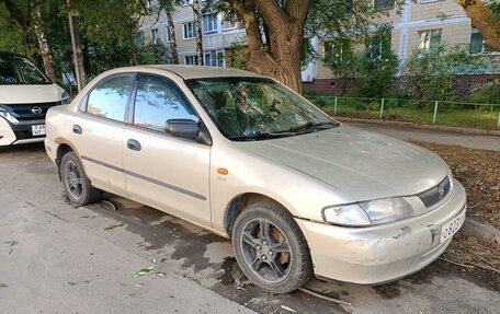 Mazda 323, 1998 год, 150 000 рублей, 4 фотография