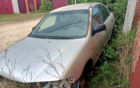 Mazda 323, 1998 год, 150 000 рублей, 15 фотография