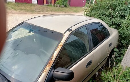 Mazda 323, 1998 год, 150 000 рублей, 19 фотография