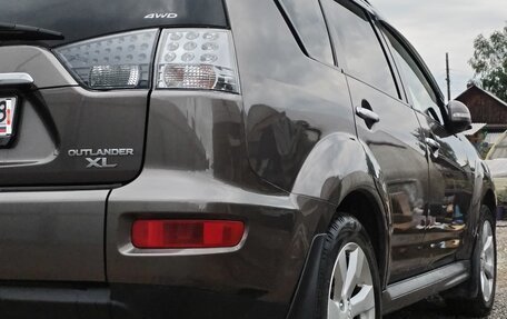 Mitsubishi Outlander III рестайлинг 3, 2012 год, 1 350 000 рублей, 19 фотография