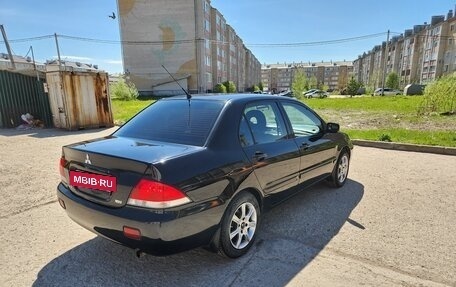 Mitsubishi Lancer IX, 2009 год, 650 000 рублей, 2 фотография