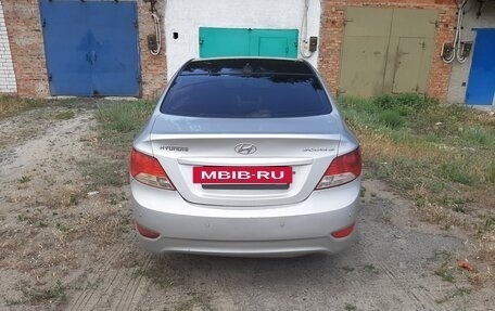 Hyundai Solaris II рестайлинг, 2011 год, 670 000 рублей, 3 фотография