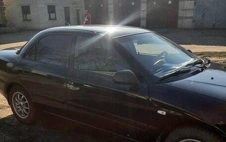 Mitsubishi Carisma I, 2001 год, 399 000 рублей, 6 фотография