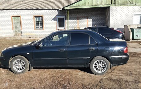 Mitsubishi Carisma I, 2001 год, 399 000 рублей, 4 фотография