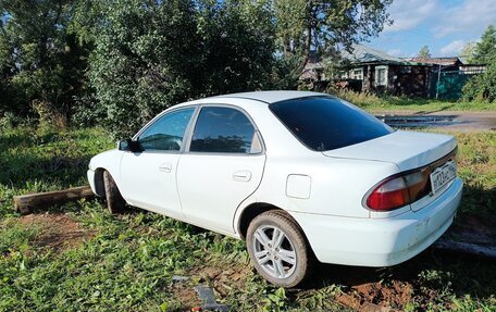 Mazda Familia, 1997 год, 180 000 рублей, 3 фотография