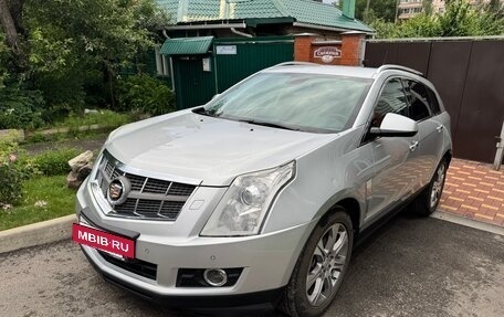 Cadillac SRX II рестайлинг, 2011 год, 1 400 000 рублей, 2 фотография