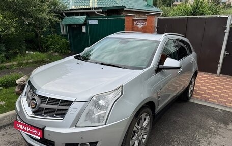 Cadillac SRX II рестайлинг, 2011 год, 1 400 000 рублей, 7 фотография