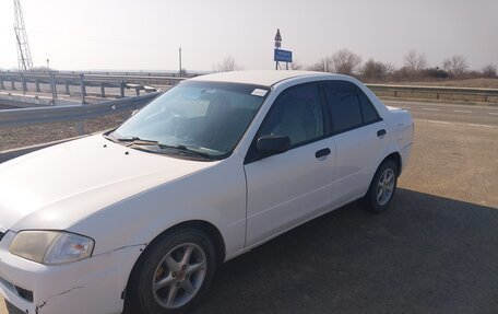 Mazda Familia, 1998 год, 195 000 рублей, 8 фотография