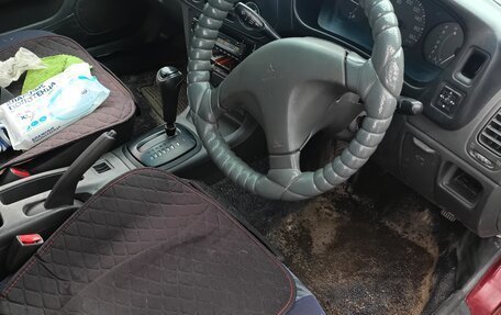 Mitsubishi Mirage VI рестайлинг, 1997 год, 185 000 рублей, 7 фотография