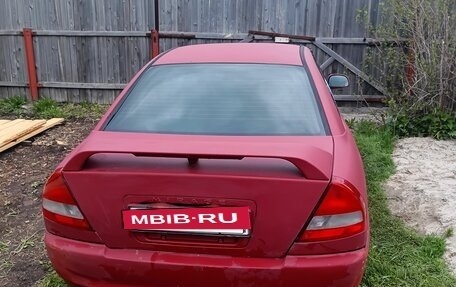 Mitsubishi Mirage VI рестайлинг, 1997 год, 185 000 рублей, 6 фотография