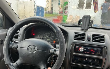 Mazda Protege, 1998 год, 200 000 рублей, 9 фотография