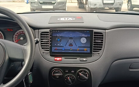 KIA Rio II, 2011 год, 650 000 рублей, 11 фотография