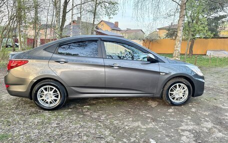 Hyundai Solaris II рестайлинг, 2011 год, 655 000 рублей, 3 фотография
