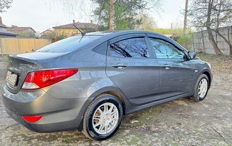 Hyundai Solaris II рестайлинг, 2011 год, 655 000 рублей, 12 фотография