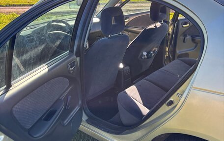 Toyota Avensis III рестайлинг, 2001 год, 400 000 рублей, 25 фотография