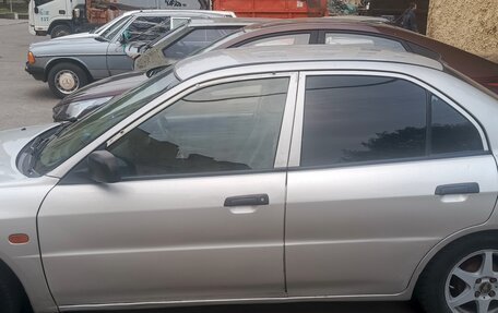 Mitsubishi Lancer VII, 1998 год, 250 000 рублей, 2 фотография