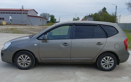 KIA Carens III (RP), 2011 год, 700 000 рублей, 8 фотография