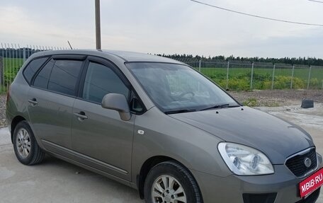 KIA Carens III (RP), 2011 год, 700 000 рублей, 4 фотография