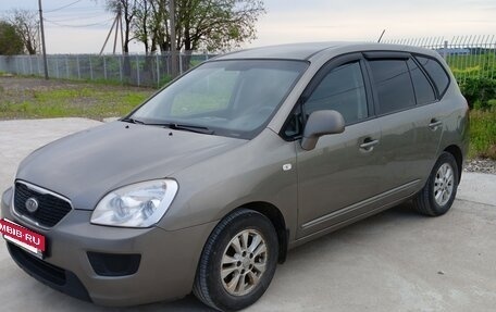 KIA Carens III (RP), 2011 год, 700 000 рублей, 3 фотография