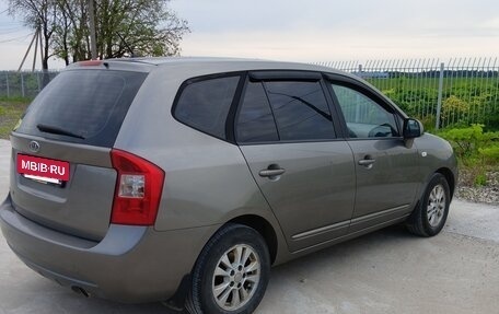 KIA Carens III (RP), 2011 год, 700 000 рублей, 5 фотография