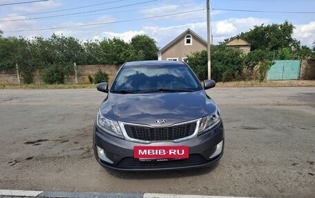 KIA Rio III рестайлинг, 2013 год, 730 000 рублей, 10 фотография