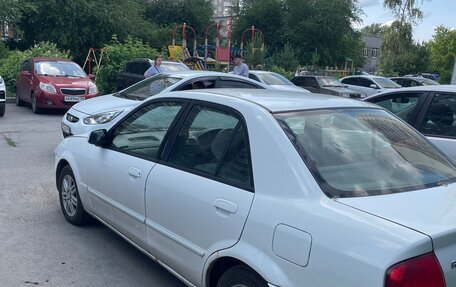 Mazda Familia, 1998 год, 230 000 рублей, 2 фотография