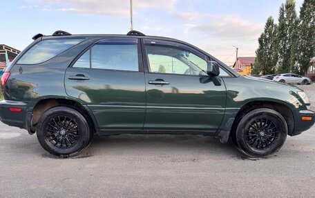 Lexus RX IV рестайлинг, 1998 год, 750 000 рублей, 2 фотография