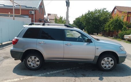 Mitsubishi Outlander III рестайлинг 3, 2007 год, 750 000 рублей, 4 фотография