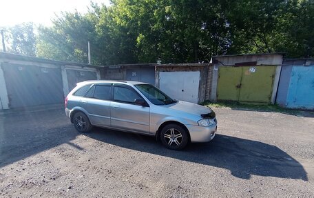 Mazda Familia, 1998 год, 370 000 рублей, 4 фотография
