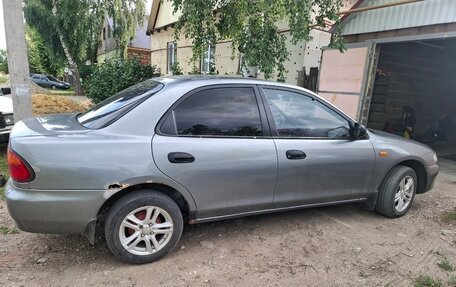 Mazda 323, 1994 год, 150 000 рублей, 2 фотография