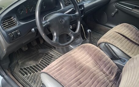 Mazda 323, 1994 год, 150 000 рублей, 4 фотография