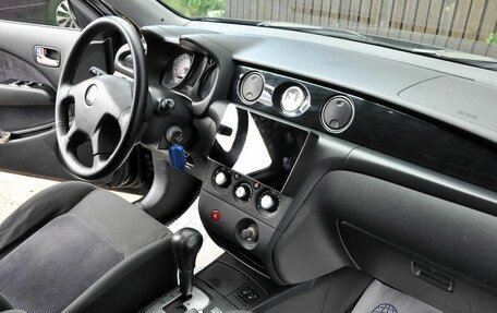 Mitsubishi Outlander III рестайлинг 3, 2004 год, 650 000 рублей, 10 фотография