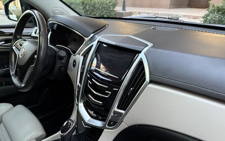 Cadillac SRX II рестайлинг, 2014 год, 1 490 000 рублей, 12 фотография