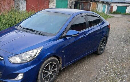 Hyundai Solaris II рестайлинг, 2011 год, 620 000 рублей, 3 фотография