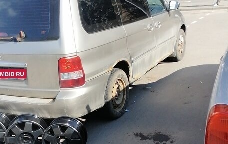 KIA Carnival III, 2003 год, 350 000 рублей, 17 фотография