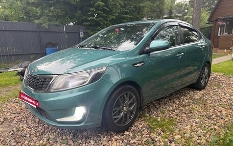 KIA Rio III рестайлинг, 2011 год, 750 000 рублей, 2 фотография