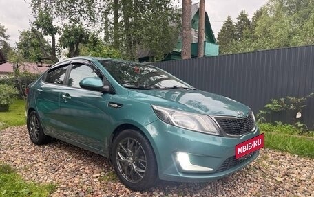 KIA Rio III рестайлинг, 2011 год, 750 000 рублей, 3 фотография