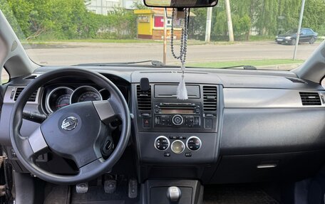Nissan Tiida, 2010 год, 800 000 рублей, 11 фотография
