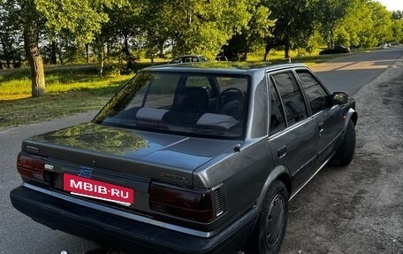 Nissan Bluebird VIII, 1989 год, 250 000 рублей, 4 фотография