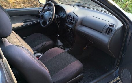Mazda 323, 1996 год, 200 000 рублей, 10 фотография