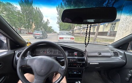 Mazda 323, 1996 год, 260 000 рублей, 8 фотография