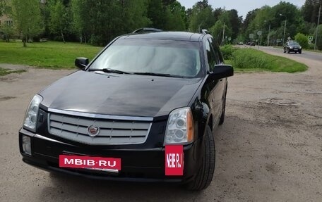 Cadillac SRX II рестайлинг, 2006 год, 850 000 рублей, 21 фотография