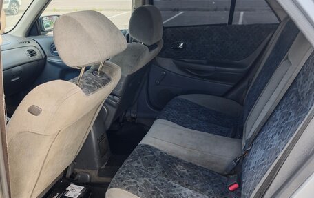 Mazda 323, 1999 год, 270 000 рублей, 9 фотография