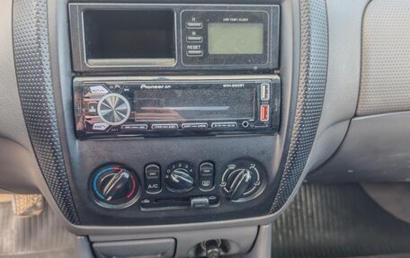 Mazda 323, 1999 год, 270 000 рублей, 11 фотография