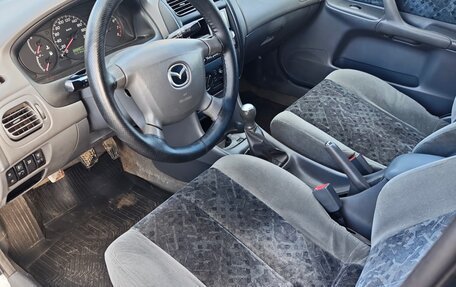 Mazda 323, 1999 год, 270 000 рублей, 8 фотография