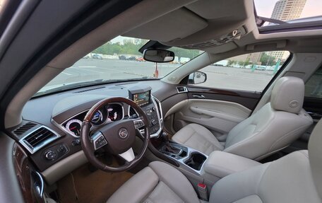 Cadillac SRX II рестайлинг, 2011 год, 1 100 000 рублей, 13 фотография