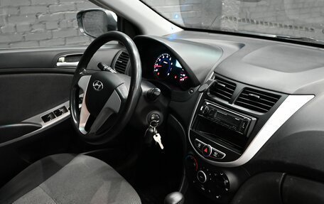 Hyundai Solaris II рестайлинг, 2011 год, 830 000 рублей, 14 фотография