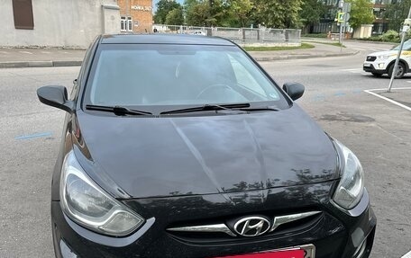 Hyundai Solaris II рестайлинг, 2011 год, 695 000 рублей, 2 фотография