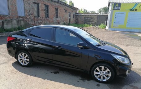 Hyundai Solaris II рестайлинг, 2011 год, 800 000 рублей, 11 фотография